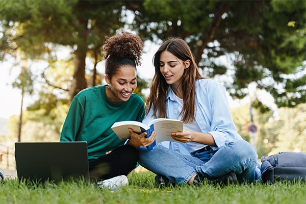 Female students studying in the park